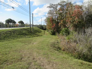 The grassy approach to the canoe launch on Willingham Road