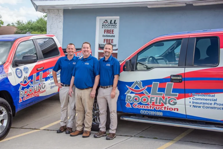 All Roofing & Construction team with company trucks